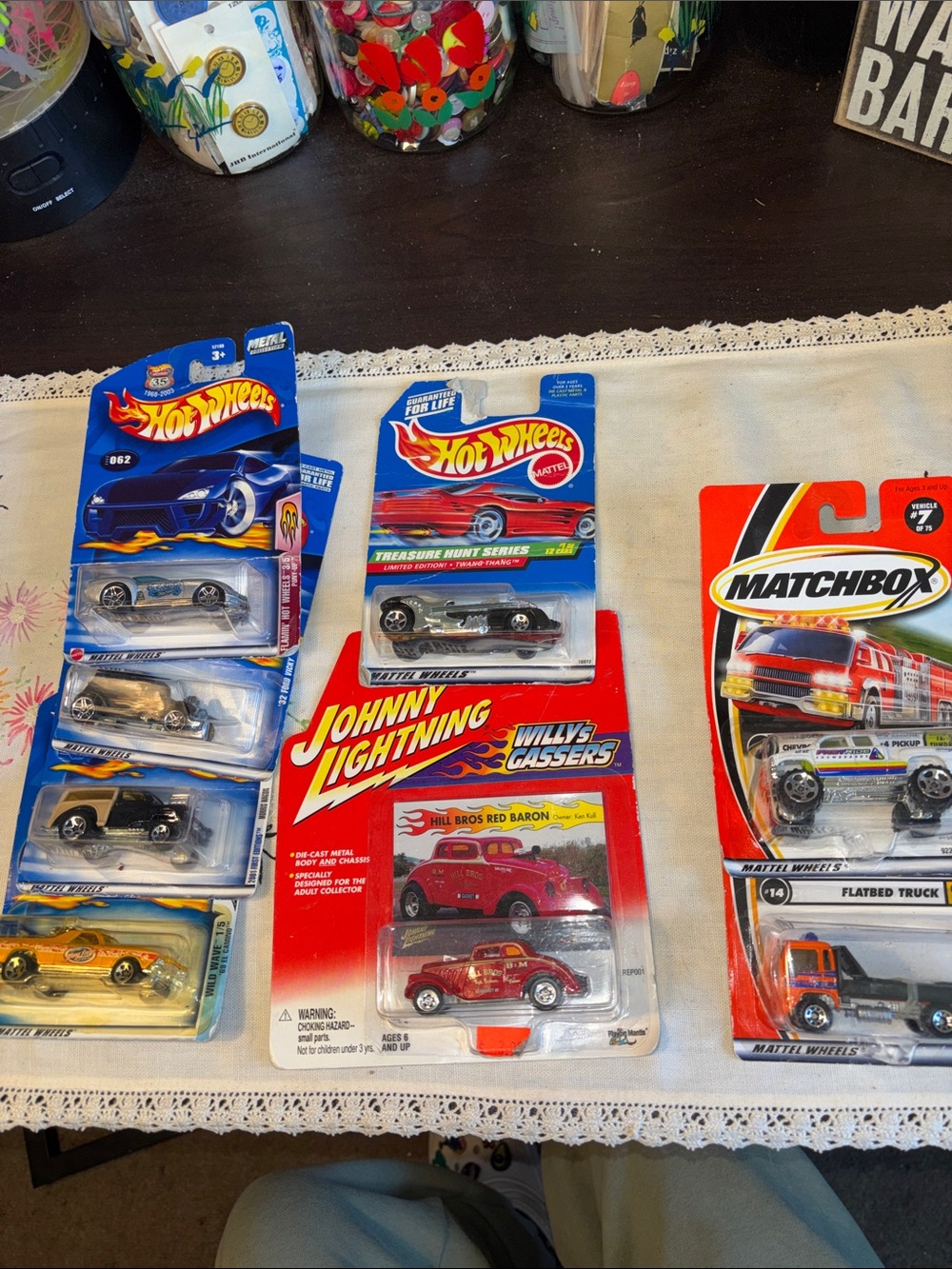 NWT 8 piece collection of Hot wheels, matchbox, and Johnny, lightning cars, and